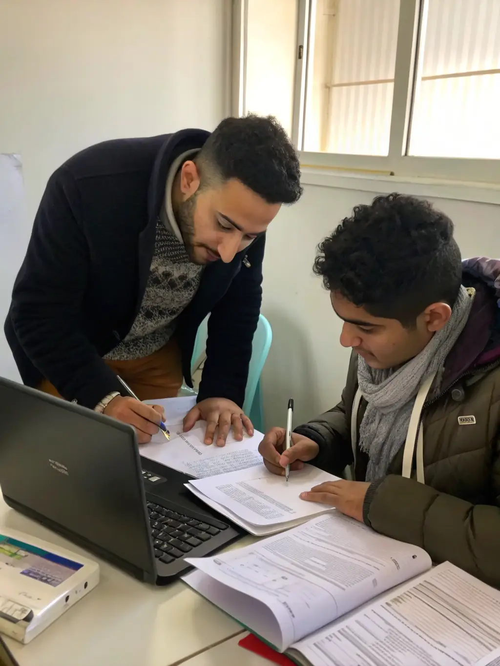 A student receiving assistance with their visa application, with a consultant guiding them through the necessary paperwork and requirements.